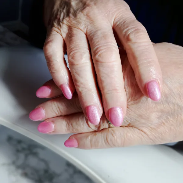 A soft rose shimmer designed to brighten and flatter, giving a natural glow with a touch of quiet elegance.